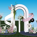 Outdoor Heart Shaped Arch With Pink White Flowers Ribbon And Floral Decorations On Grassy Lawn