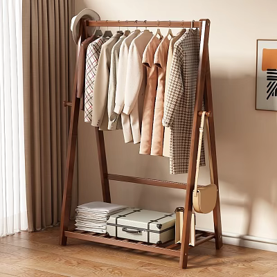 Stylish Clothes Hanging On Wooden Rack With Folded Items And Suitcase In Cozy Indoor Setting 3d model