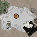 Stylish Shaped Rug with Curved Lines in Modern Living Room with Chair Fruit Bowl and Plant
