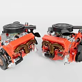 Two Red Mechanical Engines Featuring Black Covers And Metal Components On 3d model