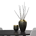 Modern Black Round Dining Table Set with Light Gray Chairs and Decorative Vase 3d model