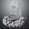 Gray Stone Sculptural Structure With Central Hole Circular Disk And Surrounding Pebbles