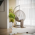 Rattan Hanging Chair In Cozy Indoor Space With Green Plants White Curtains And Soft Rug