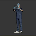 Man In Blue Medical Scrubs Holding X Ray With Gloves And Surgical Cap