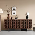 Brown Entryway Cabinet Sideboard With Circular Hole Design Floor Lamp Vase And Wall Paintings