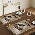 Elegant Dining Table Setting With Placemats Plates Napkins Gold Spoons Chopsticks And Wine Glasses