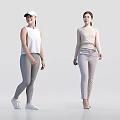 Two Women In Casual Outfits With Sleeveless Top And Turtleneck