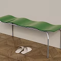 Green Wavy Seat Shoe Bench with Metal Frame and White Slippers