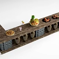 Rustic Wooden Bar Counter With Fruit Basket Nuts Drinks And Brick Base
