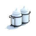 White Ceramic Food Storage Jars With Lids On Black Metal Stand