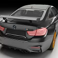 Black Two Door BMW Sports Car With Orange Wheels And Aerodynamic Front Lip