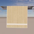 Beige Towel With White Stripe Hanging On Black Rack Against Gray Background