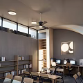 Modern Cultural Center Interior Design With Wooden Bookshelves And Seating Areas