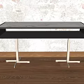 Stylish Black Console Table With Metal Legs On Wooden Floor Against Textured Wall