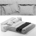 Modern Double Bed With Sleek Frame Comfortable Mattress And White Black Linens