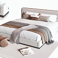 Modern Double Bed With Upholstered Headboard Soft Pillows Layered Blankets And Area Rug