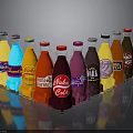 Colorful Assorted Drink Bottles With Various Flavors And Brand Labels