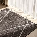 Dark Gray Square Rug With Geometric White Lines On Wooden Floor In Sunlit Room