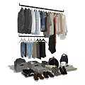 Clothes Hanging On A Rack With Various Styles Colors Bags Shoes And Scarves
