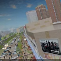 Vibrant Commercial Street With International Cinema Billboards Brand Stores High Rise Buildings And Cars