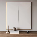 Wall Art With White Frame Golden Border And Symmetric Semicircle Patterns On Tabletop