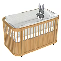 Wooden Baby Crib With Light Wood Slatted Railings White Mattress And Gray Rabbit Toy