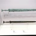 Ancient Bronze Swords As Historical Weapons Exhibited In Museum Display Case 3d model