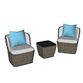 Rattan Single Sofa with White Cushions Blue Pillows and Small Black Side Table