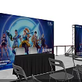 Event Stage Setup With Rows Of Seats Large Screens And Lighting Equipment