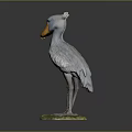 Realistic Bird Sculptures With Gray Feathers Orange Beaks And Green Bases