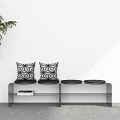 Interior Scene With Grey Bench Geometric Pattern Cushions Open Shelf Book Green Plant White Wall