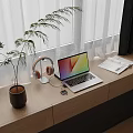 Modern Desk Setup by Window with Potted Plant Headphones Mobile Phone Laptop and Open Notebook
