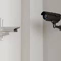 White And Black Surveillance Cameras Mounted On White Wall For Security Monitoring