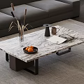 Modern Marble Coffee Table with Gray Sofa Vase Reeds Cup Oranges and Book
