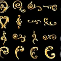 Intricate Gold and Black Decorative Carvings with Curved Patterns as Ornate Design Elements