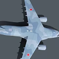 Camouflage Painted Military Transport Aircraft With Twin Engines And Red Wing Insignia