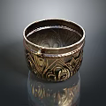 Intricate Metal Carved Sculpture With Ornate Patterns Decorative Container Design And Shiny Surface