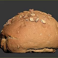 Freshly Baked Golden Round Bread Topped With Crunchy Oat Flakes And Soft Texture