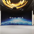 Innovative Exhibition Space With Large LED Screen And Golden Circular Lighting Design