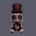 Stuffed Doll With Black Top Hat Red Accents Round Eyes And Black White Red Pattern