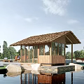Scenic Wooden Waterfront Hut With Thatched Roof And Stone Decorations By Lake