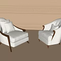 White Lounge Chairs Featuring Wooden Arms Button Tufted Backs and Ornate Wall Molding