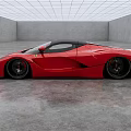 Red Sports Car With Streamlined Design And Black Wheels In Modern Indoor Gray Space