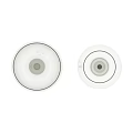Two Elegant Transparent Wine Glasses Placed On Grey Table Against Dark Background