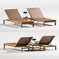 Two Rattan Woven Lounge Chairs With Wooden Frame And Side Table Lamp