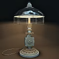 Industrial Style Table Lamp With Metal Gear Base And Wire Mesh Shade
