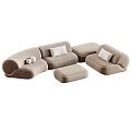 Modern Modular Sectional Sofa With Neutral Blush Tones Throw Pillows And Ottoman