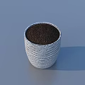 Potted Bonsai Plant with Woven Texture Ceramic Pot and Lush Green Foliage on Blue Background