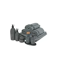 Sleep Themed Bath Essentials With Grey Bottles Rolled Towels And Jars On Tray