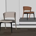 Modern Dining Chairs Featuring Light Beige Brown Leather Seats Curved Backrests And Black Metal Legs